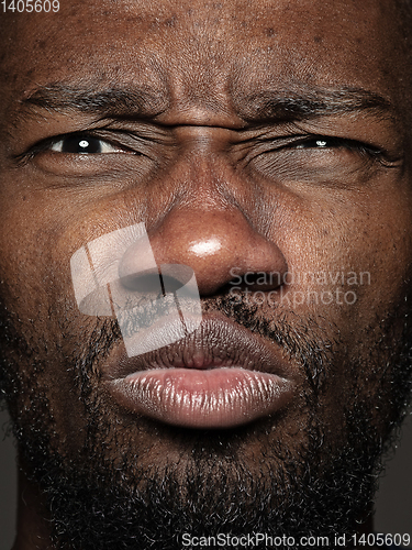 Image of Close up portrait of young african-american man