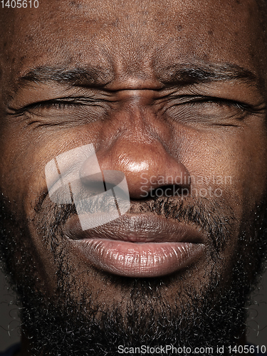 Image of Close up portrait of young african-american man