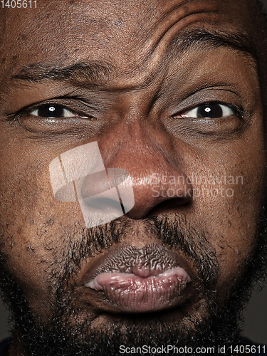 Image of Close up portrait of young african-american man