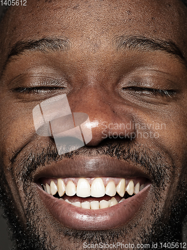 Image of Close up portrait of young african-american man