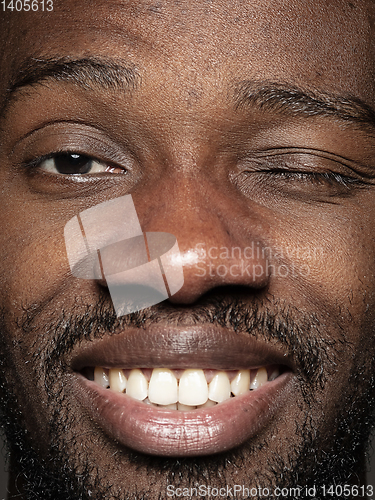 Image of Close up portrait of young african-american man