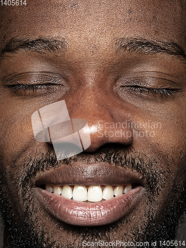 Image of Close up portrait of young african-american man