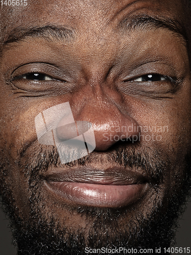 Image of Close up portrait of young african-american man