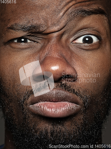 Image of Close up portrait of young african-american man