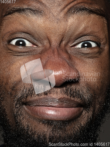 Image of Close up portrait of young african-american man