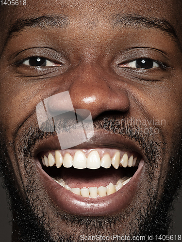 Image of Close up portrait of young african-american man