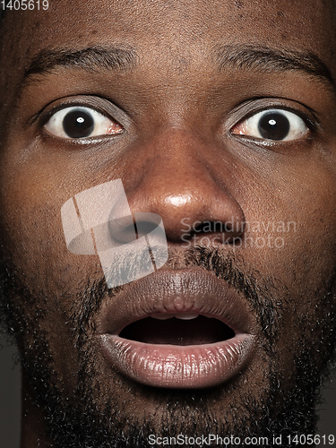 Image of Close up portrait of young african-american man