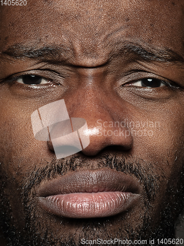 Image of Close up portrait of young african-american man