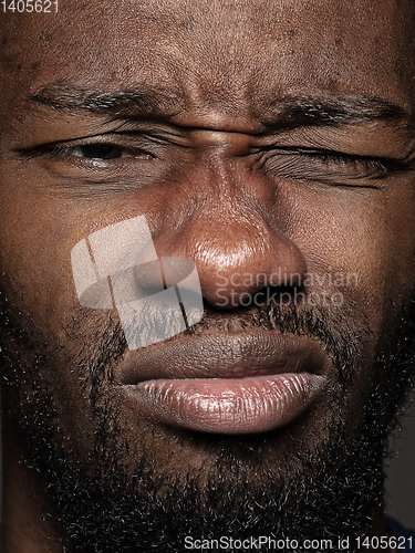 Image of Close up portrait of young african-american man