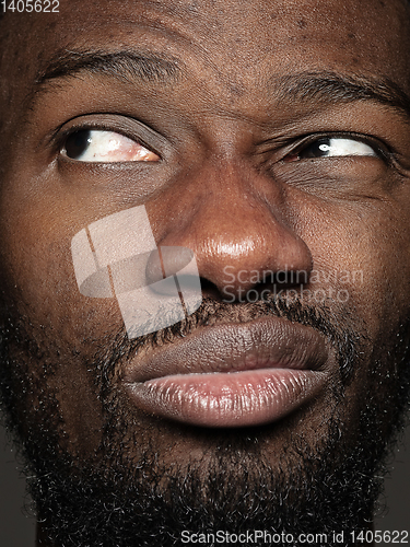 Image of Close up portrait of young african-american man