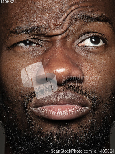 Image of Close up portrait of young african-american man