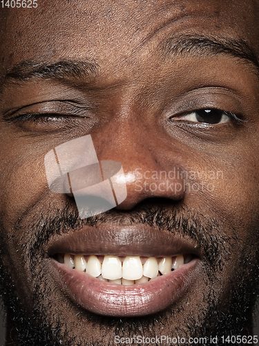 Image of Close up portrait of young african-american man