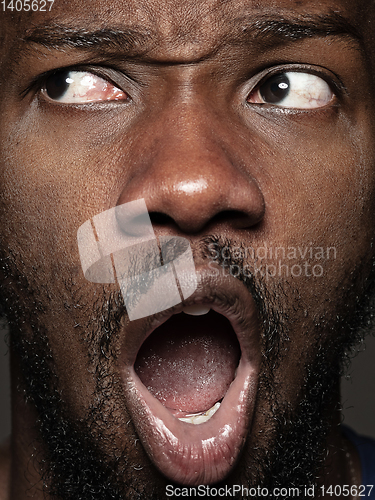 Image of Close up portrait of young african-american man