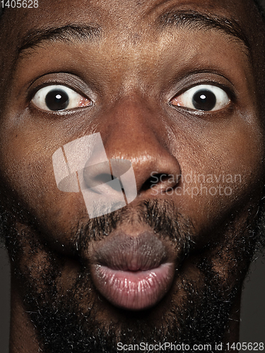 Image of Close up portrait of young african-american man