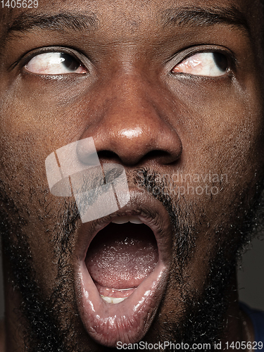 Image of Close up portrait of young african-american man