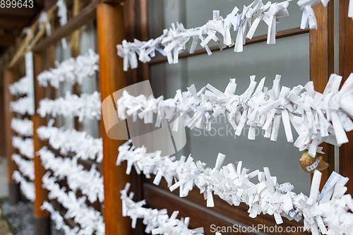 Image of Fortune papers in shrines at Japan