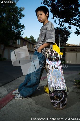 Image of Young skate boarder