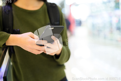 Image of Woman use of mobile phone