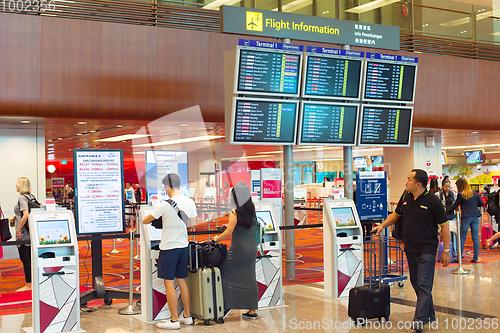 Image of Self check-in at airport. Singapore