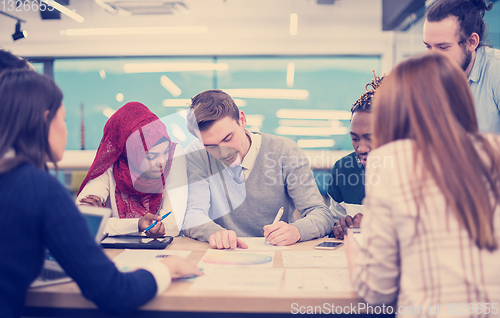 Image of Multiethnic startup business team having meeting