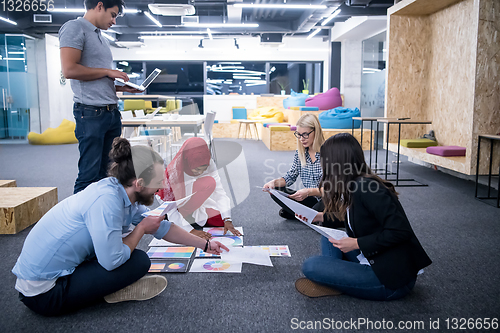 Image of black muslim woman having meeting with Multiethnic  startup busi