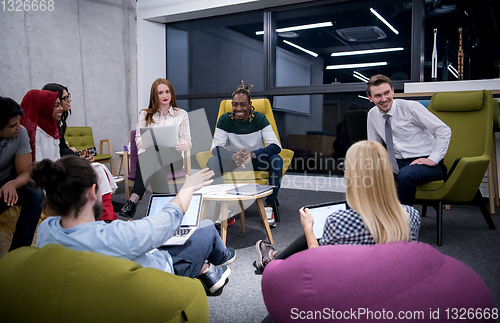 Image of Multiethnic startup business team having meeting