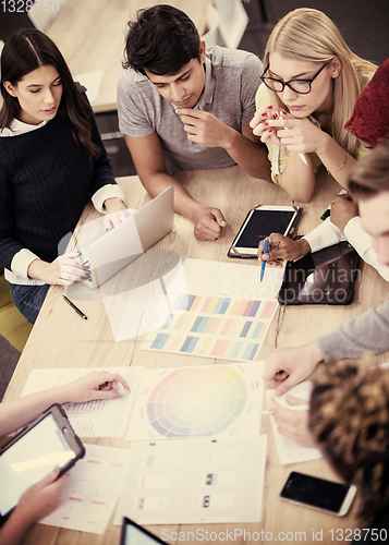 Image of Multiethnic startup business team having meeting