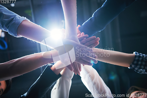 Image of multiethnic Group of young business people celebrating success