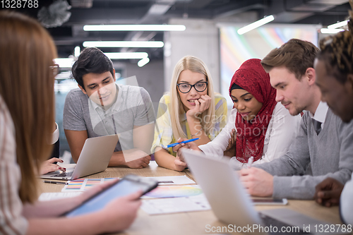 Image of Multiethnic startup business team having meeting