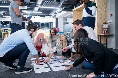 Image of black muslim woman having meeting with Multiethnic  startup busi