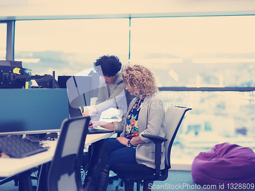 Image of young female software developers at office