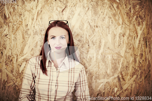 Image of portrait of young redhead business woman