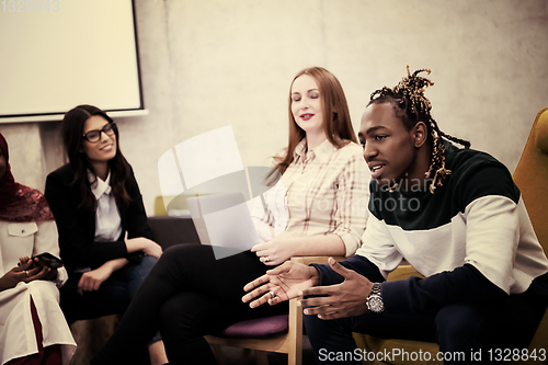 Image of Multiethnic startup business team having meeting