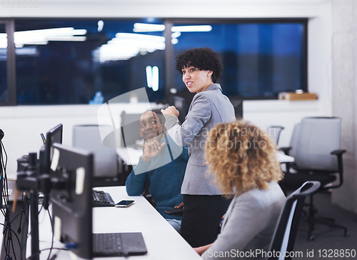 Image of multiethnics team of software developers working together