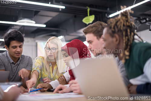Image of Multiethnic startup business team having meeting