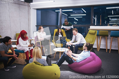 Image of Multiethnic startup business team having meeting