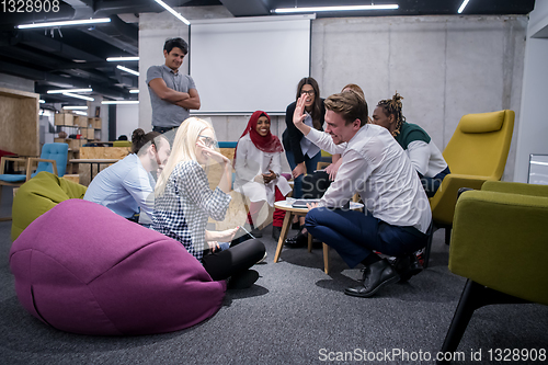 Image of Multiethnic startup business team having meeting