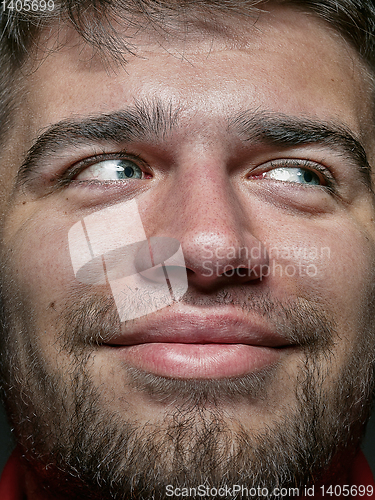 Image of Close up portrait of young caucasian man