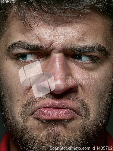 Image of Close up portrait of young caucasian man