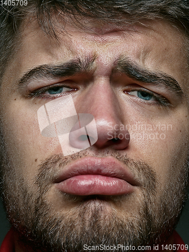 Image of Close up portrait of young caucasian man