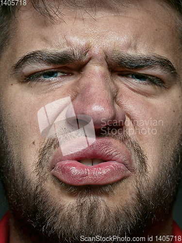 Image of Close up portrait of young caucasian man