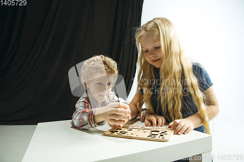 Image of Boy and girl preparing for school after a long summer break. Back to school.