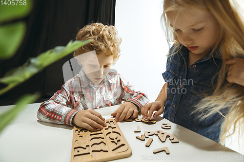 Image of Boy and girl preparing for school after a long summer break. Back to school.