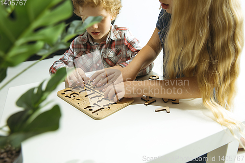 Image of Boy and girl preparing for school after a long summer break. Back to school.