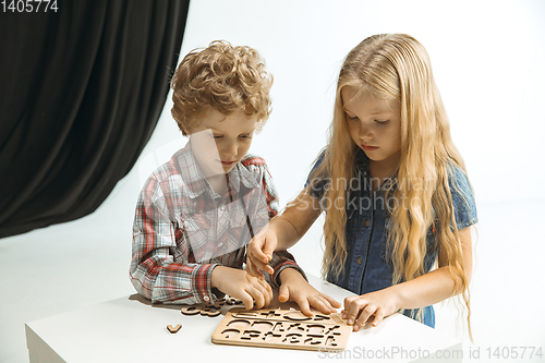 Image of Boy and girl preparing for school after a long summer break. Back to school.