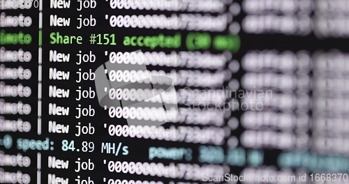 Image of Bitcoin mining program at work closeup footage