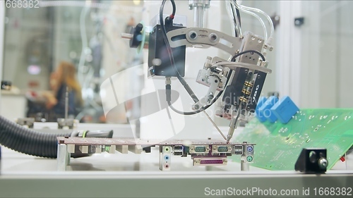 Image of Automated robotic equipment at work