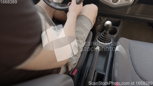 Image of Switching gearshift while driving car