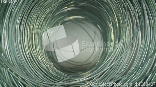 Image of Camera motion in round steel wired tunnel