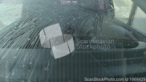 Image of Eashing dirty car closeup footage